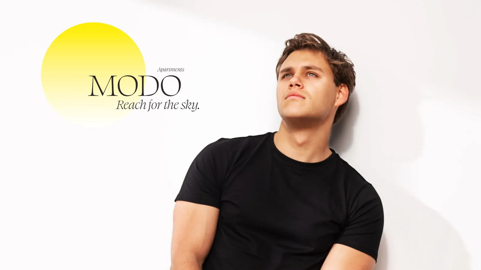 MODO apartments, Reach for the sky: a young man looks up